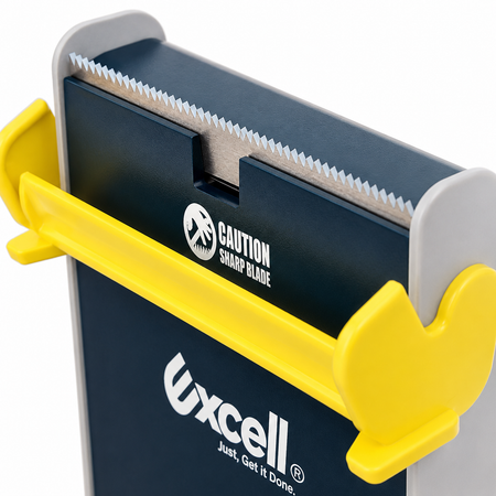 Excell vegetable chopper with yellow handle and 'Caution: Sharp Blade' label on a white background